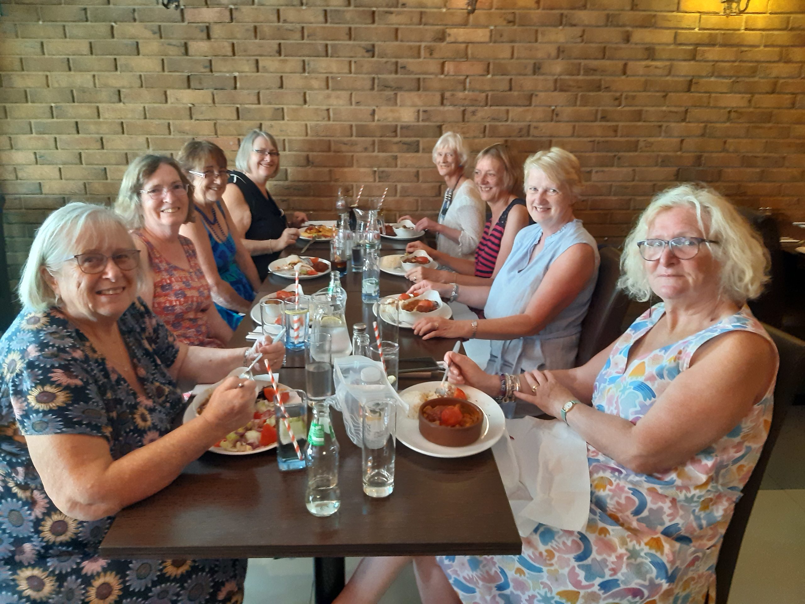 Members enjoying a meal at the Meze Lounge
