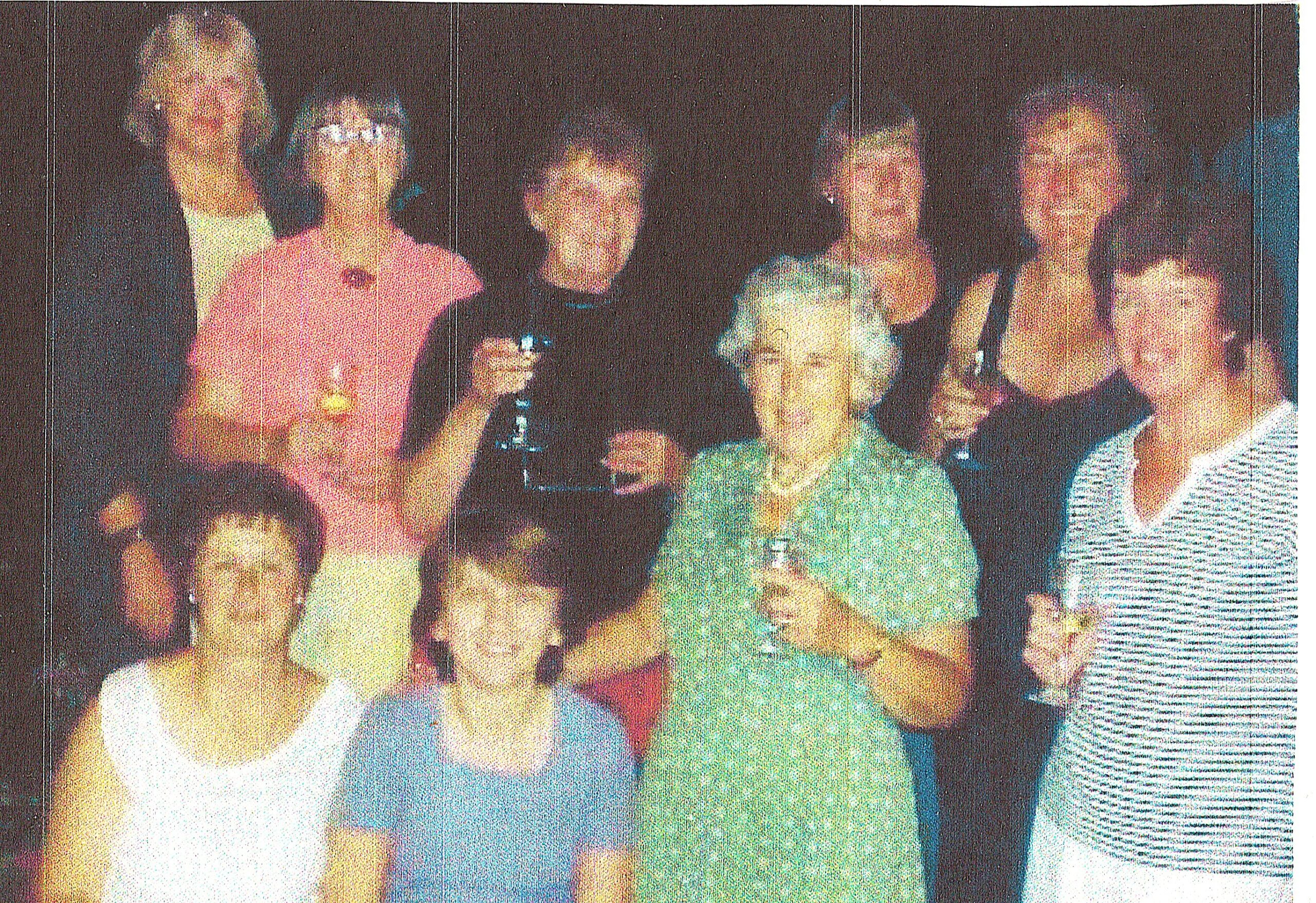 Joy Bromfield (in green dress) with members of Coventry NWR